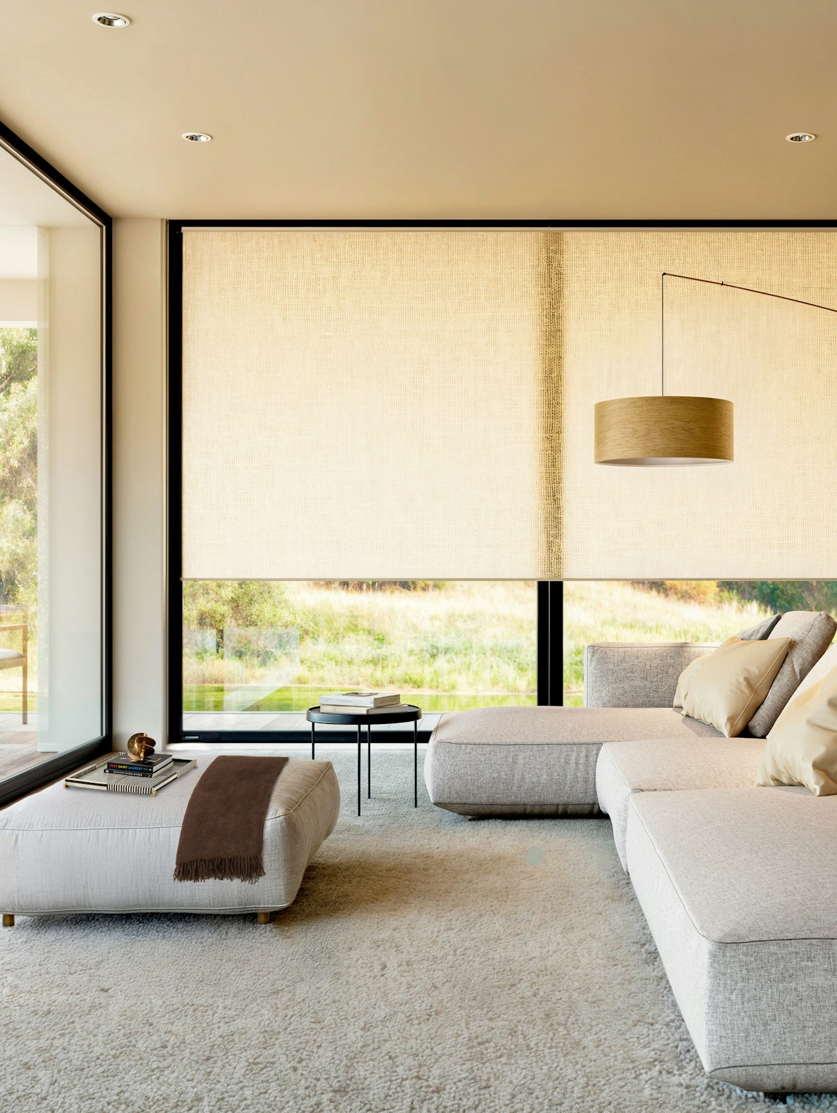 Light filtering roller shades on large windows
