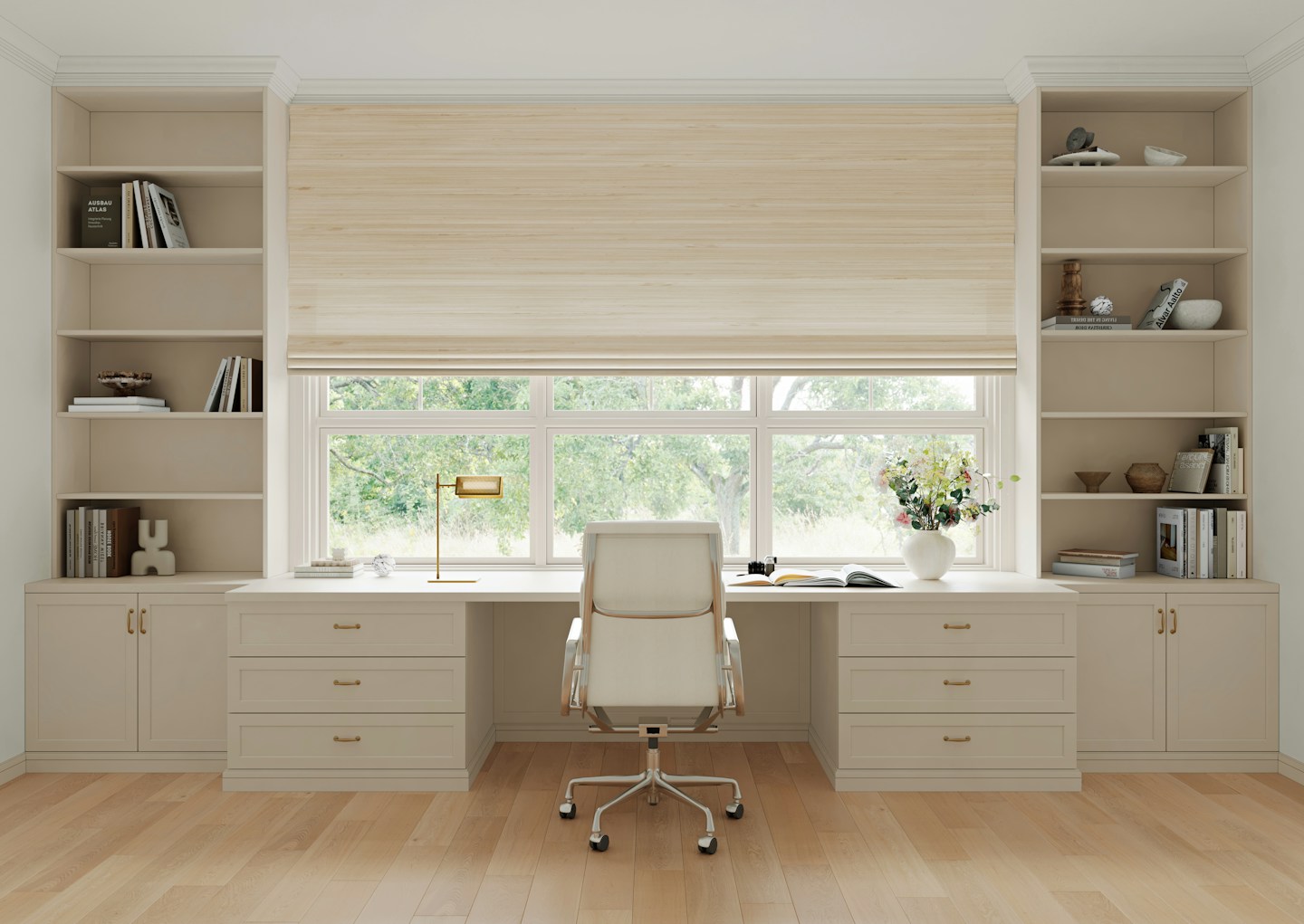 Home office with natural woven wood shades filtering sunlight through large windows, showing how window treatments can help reduce energy bills while adding warmth and style to the home.