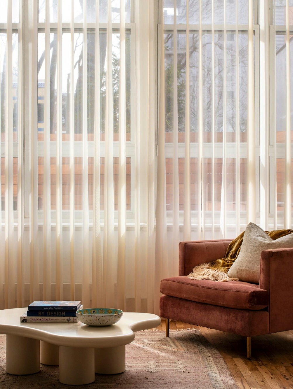 Shade Love's vertical blinds in a living room.