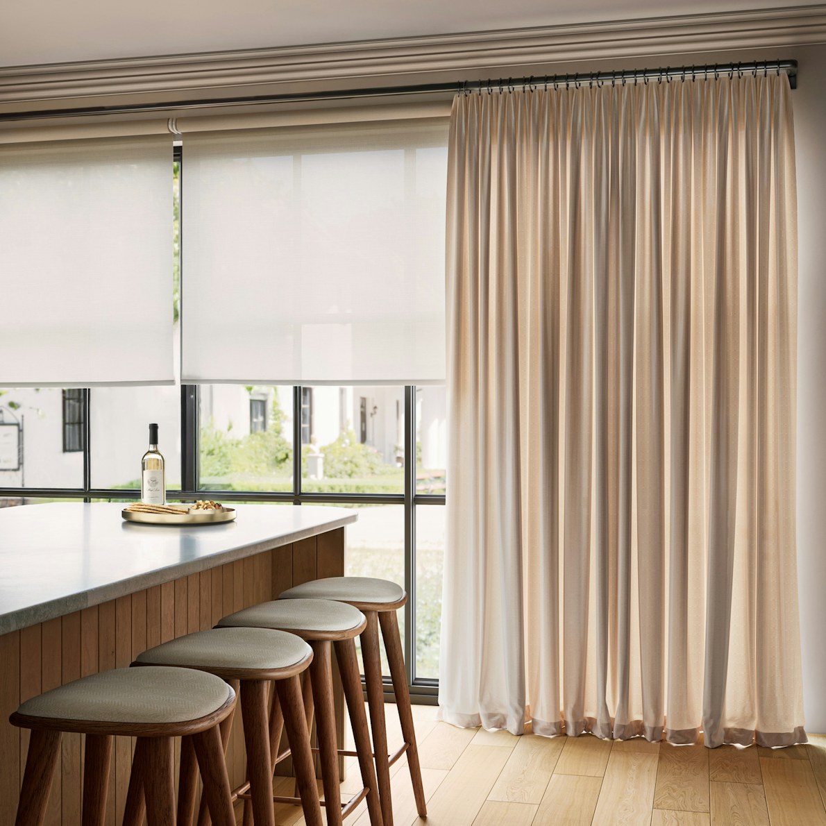 Light filtering roller shades with Westchester silk drapes and a curved French return rod